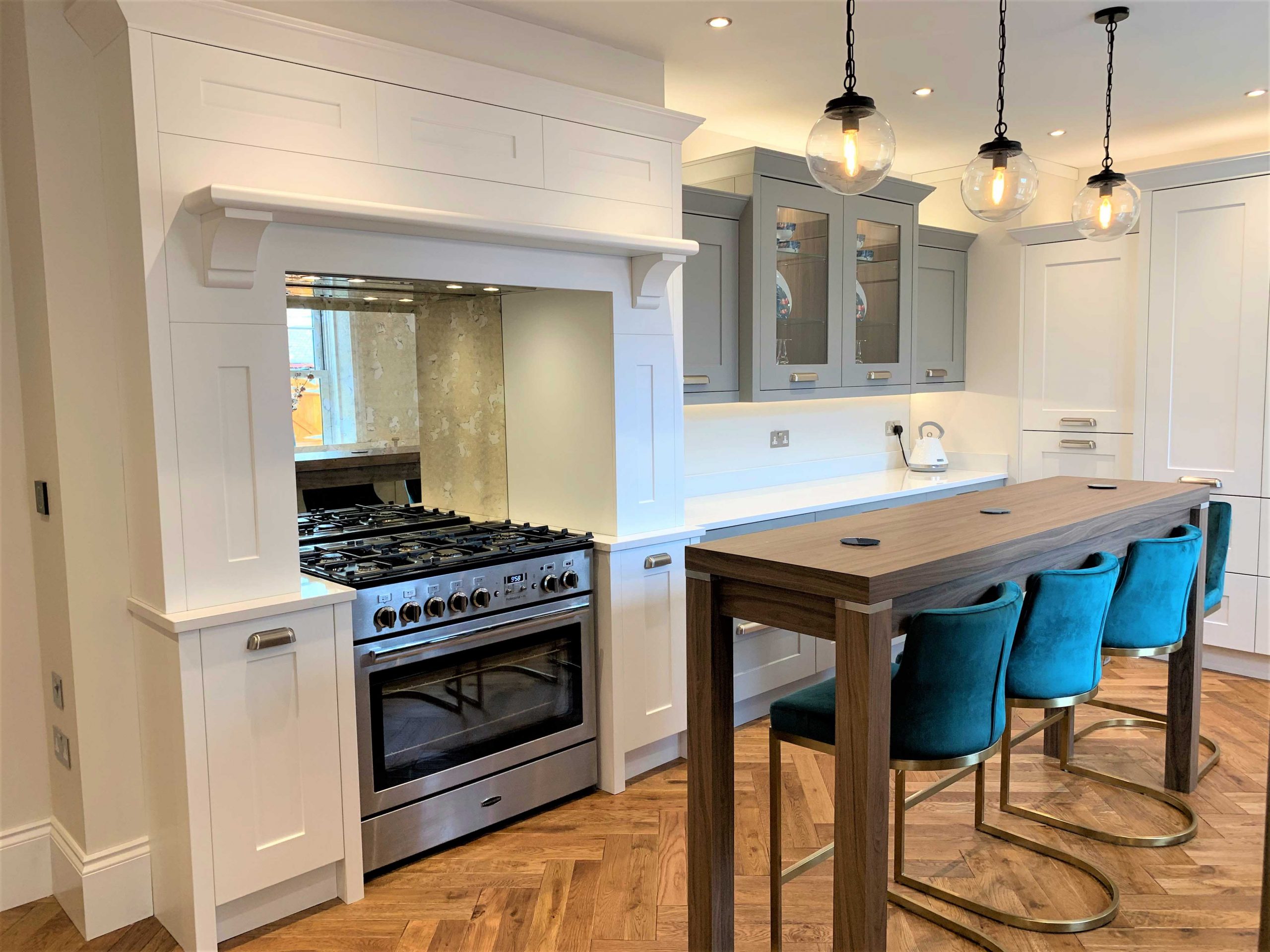 classic bespoke painted shaker kitchen with bar table