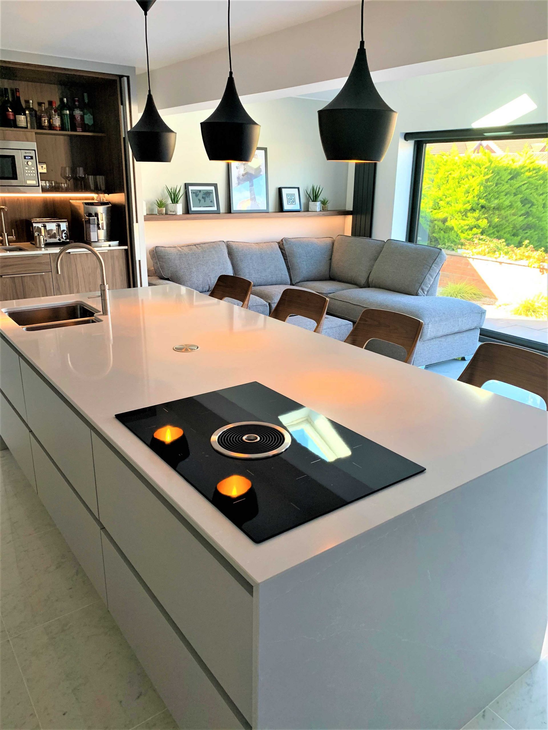 contemporary handleless breakfasting kitchen and living area