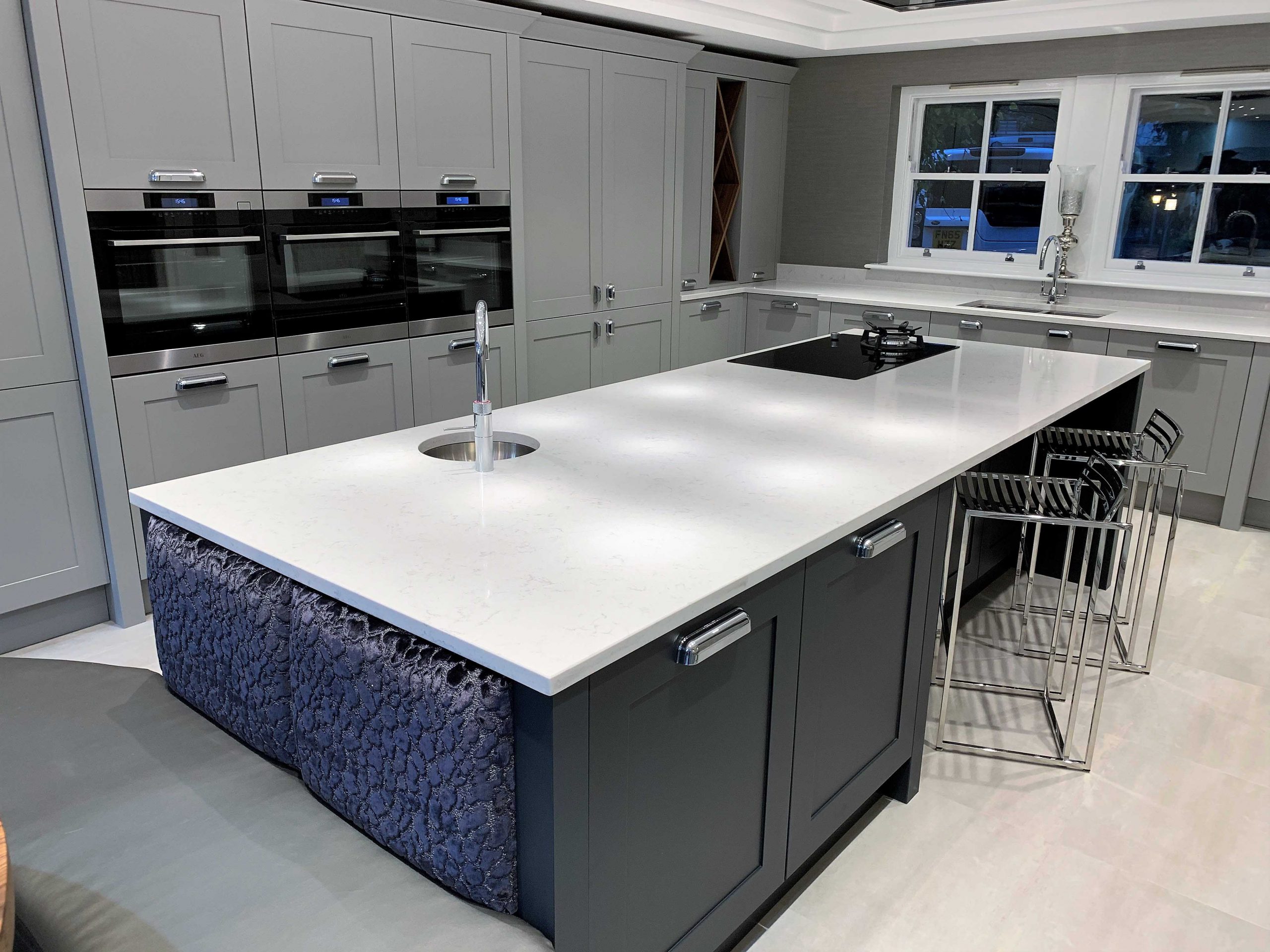 bespoke modern painted shaker kitchen with island and booth seating