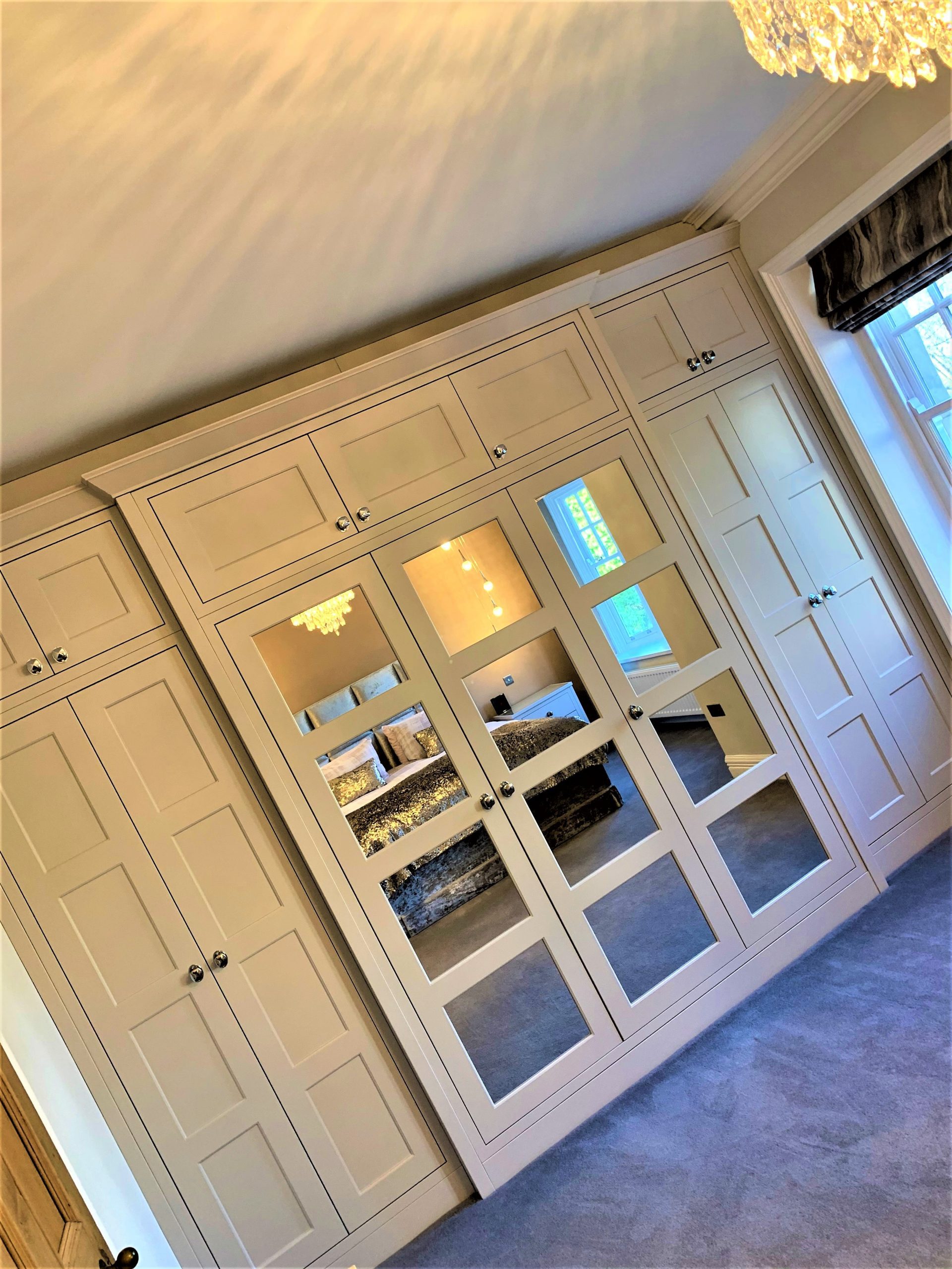 bespoke painted master bedroom furniture and dressing room with luxurious boutique style upper floor bedrooms