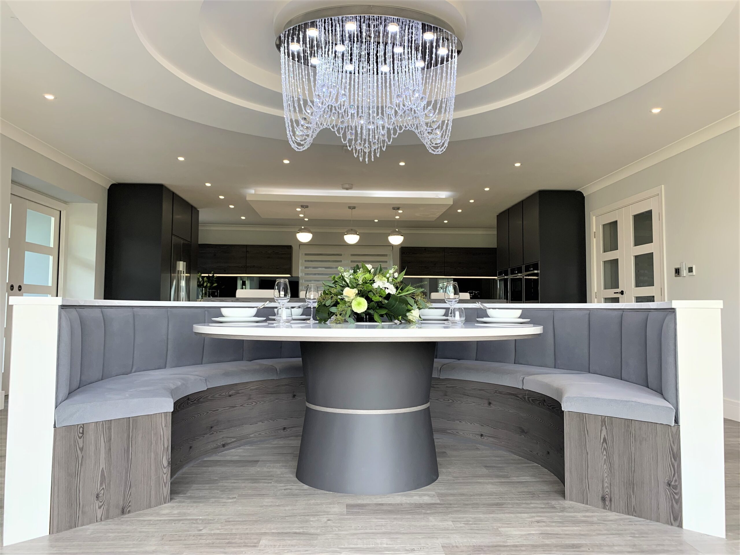 contemporary monochromatic kitchen and dining space