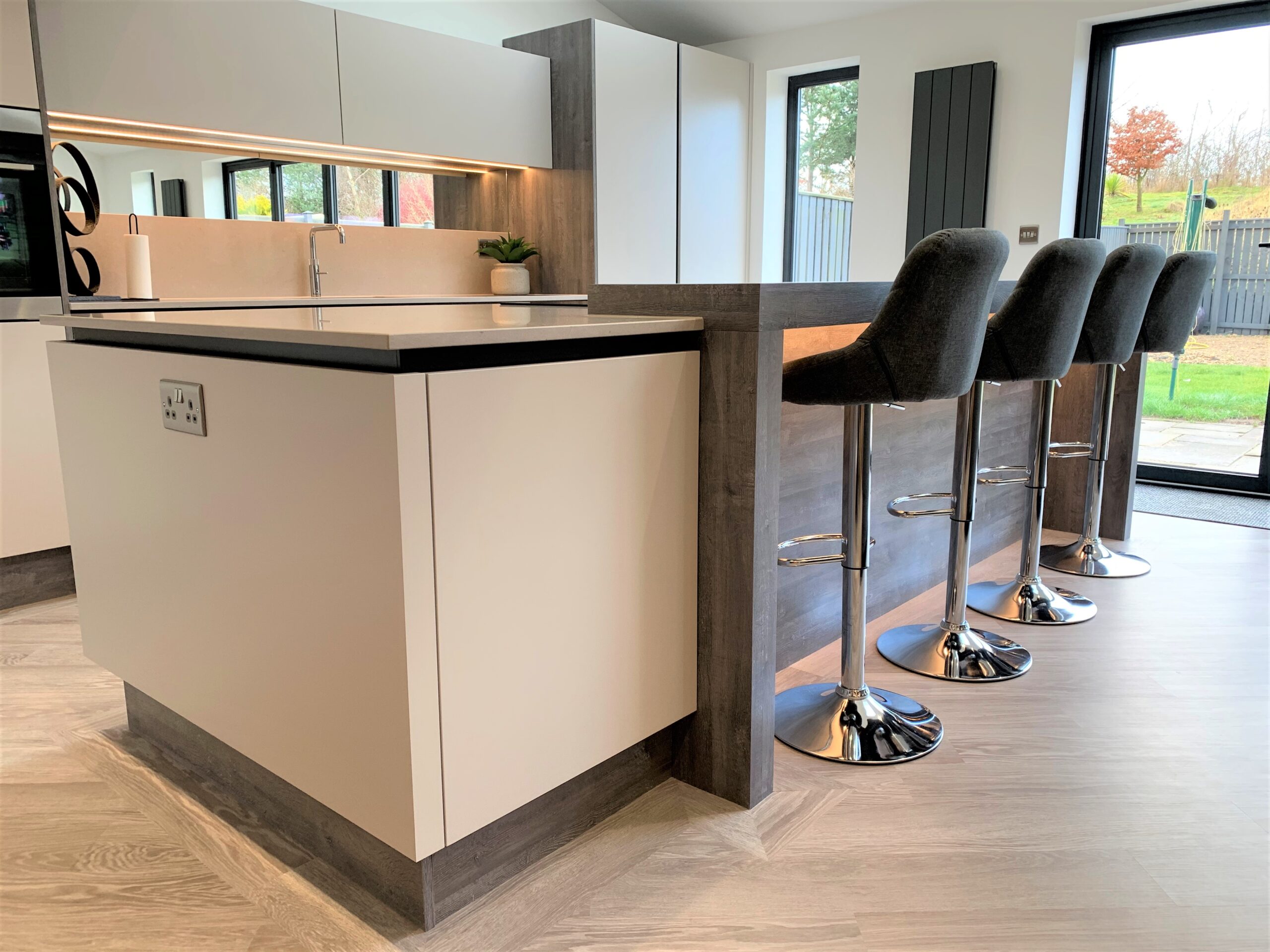 sociable breakfasting kitchen and comfy family media area