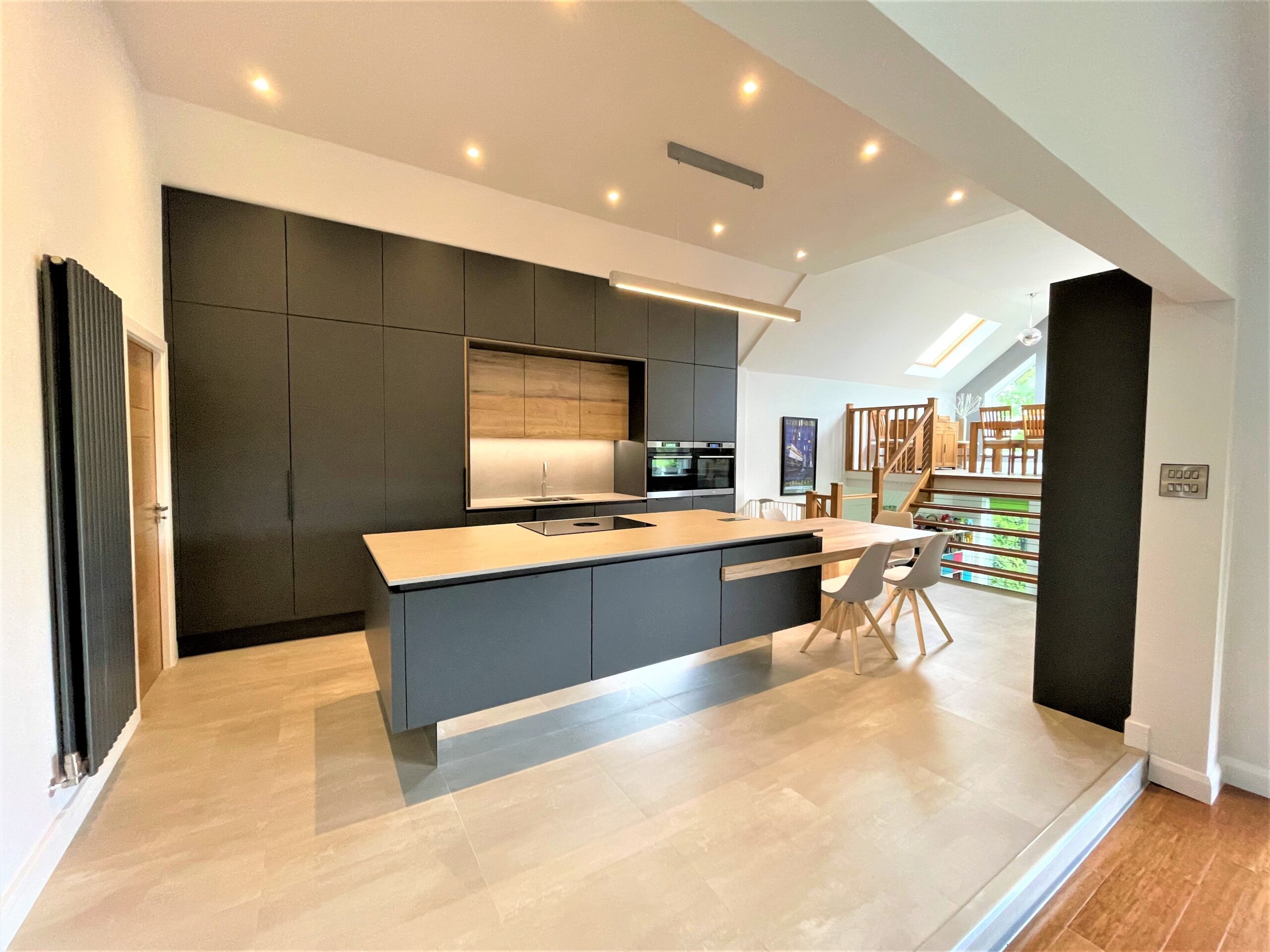 minimalist breakfasting and dining kitchen with floating effect island