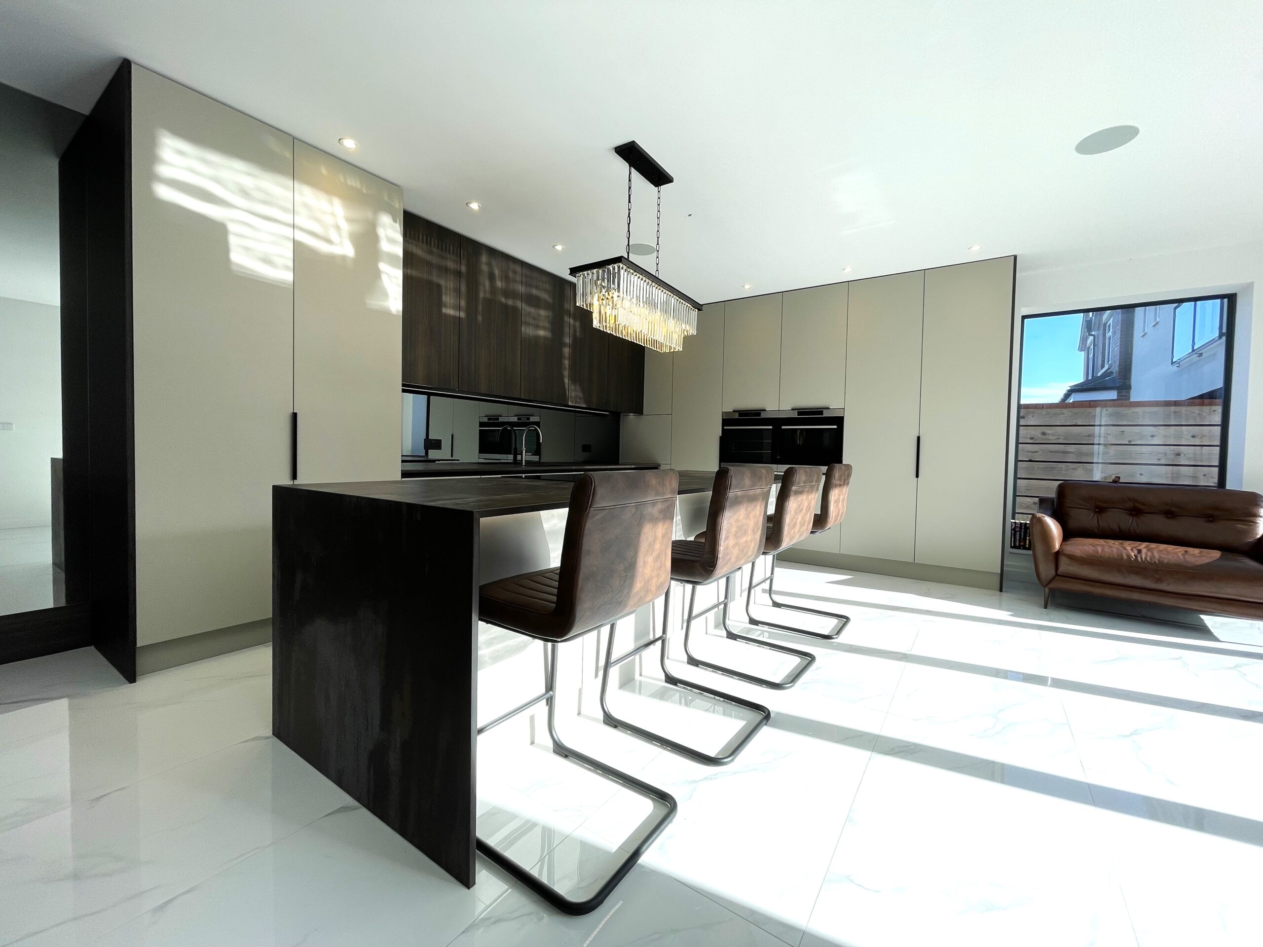 seamless breakfasting kitchen media furniture and entertaining space