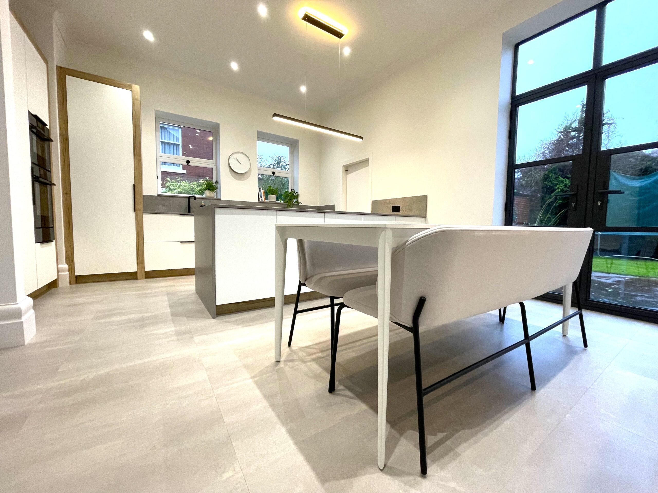 minimalist scandi inspired kitchen and dining room with Karndean flooring