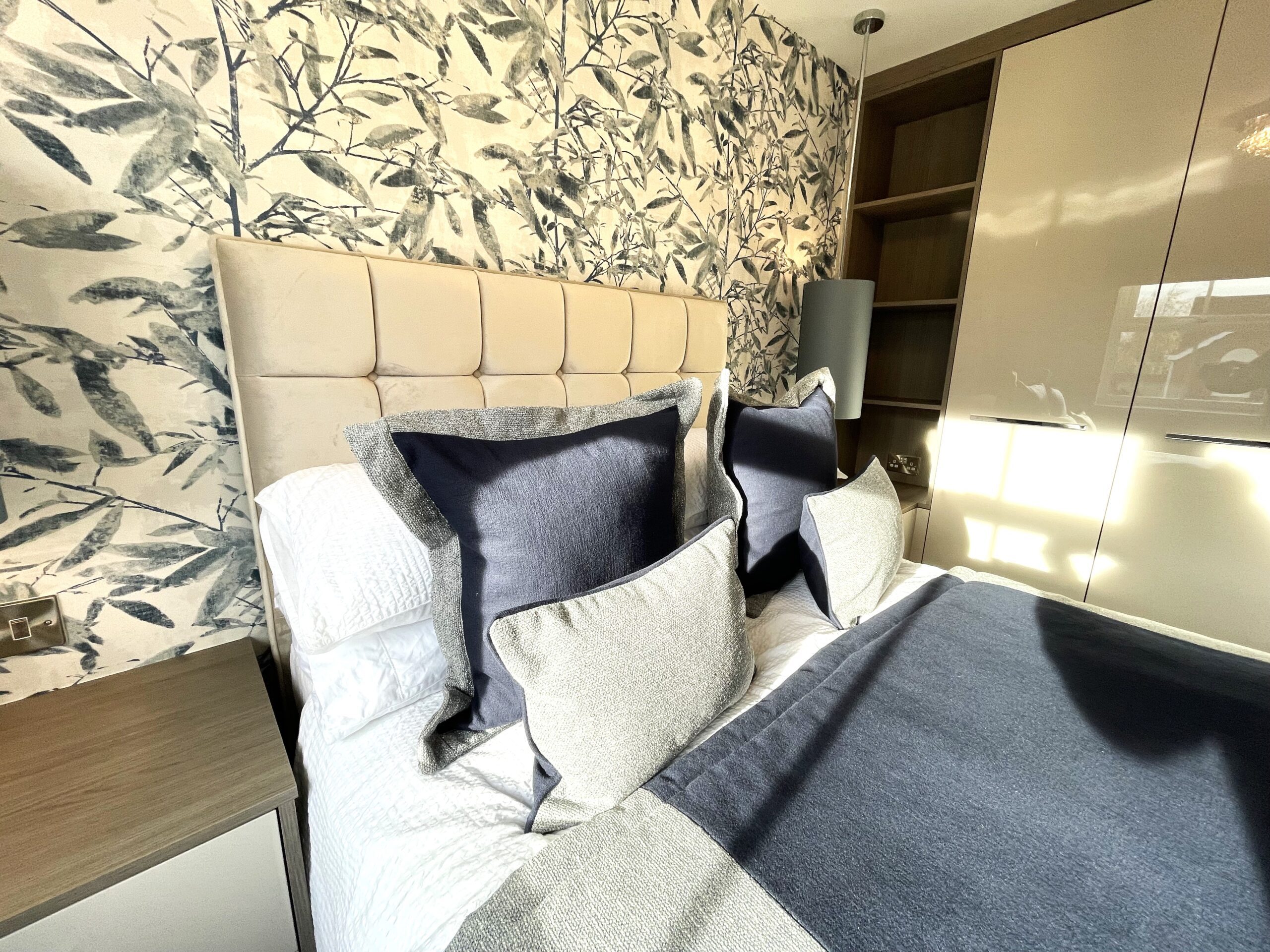 guest bedrooms in cashmere soft gloss part of a multiroom project