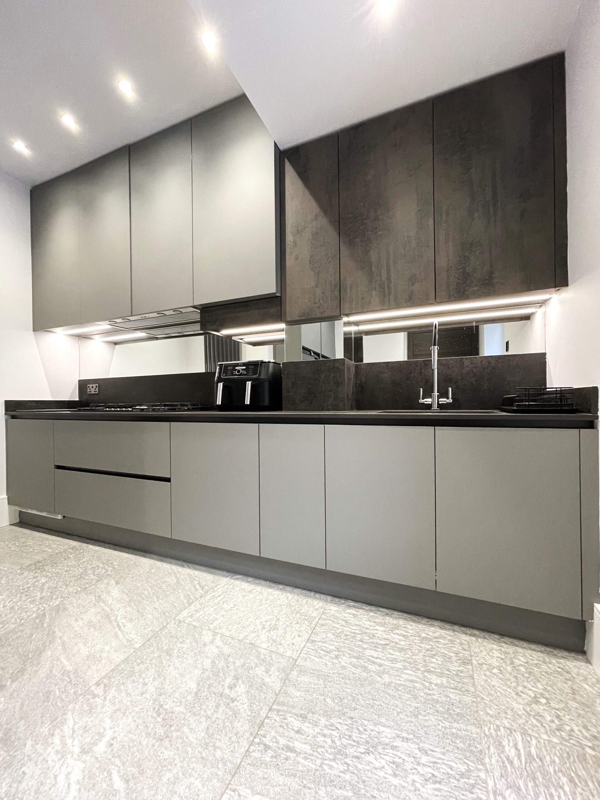 utility prep kitchen in perfect dust grey and oxide milano stone