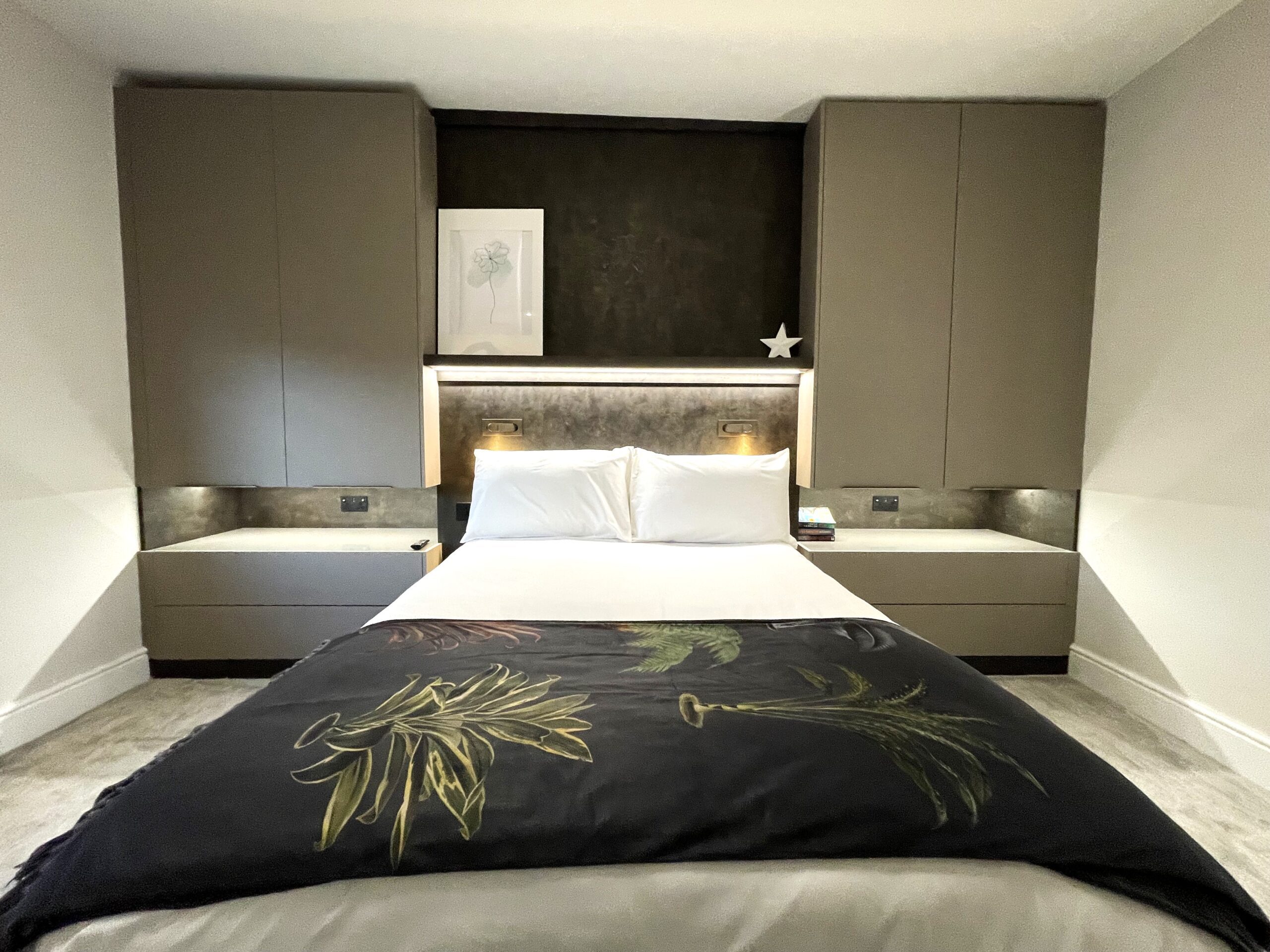 contemporary linear bespoke master bedroom and dressing room