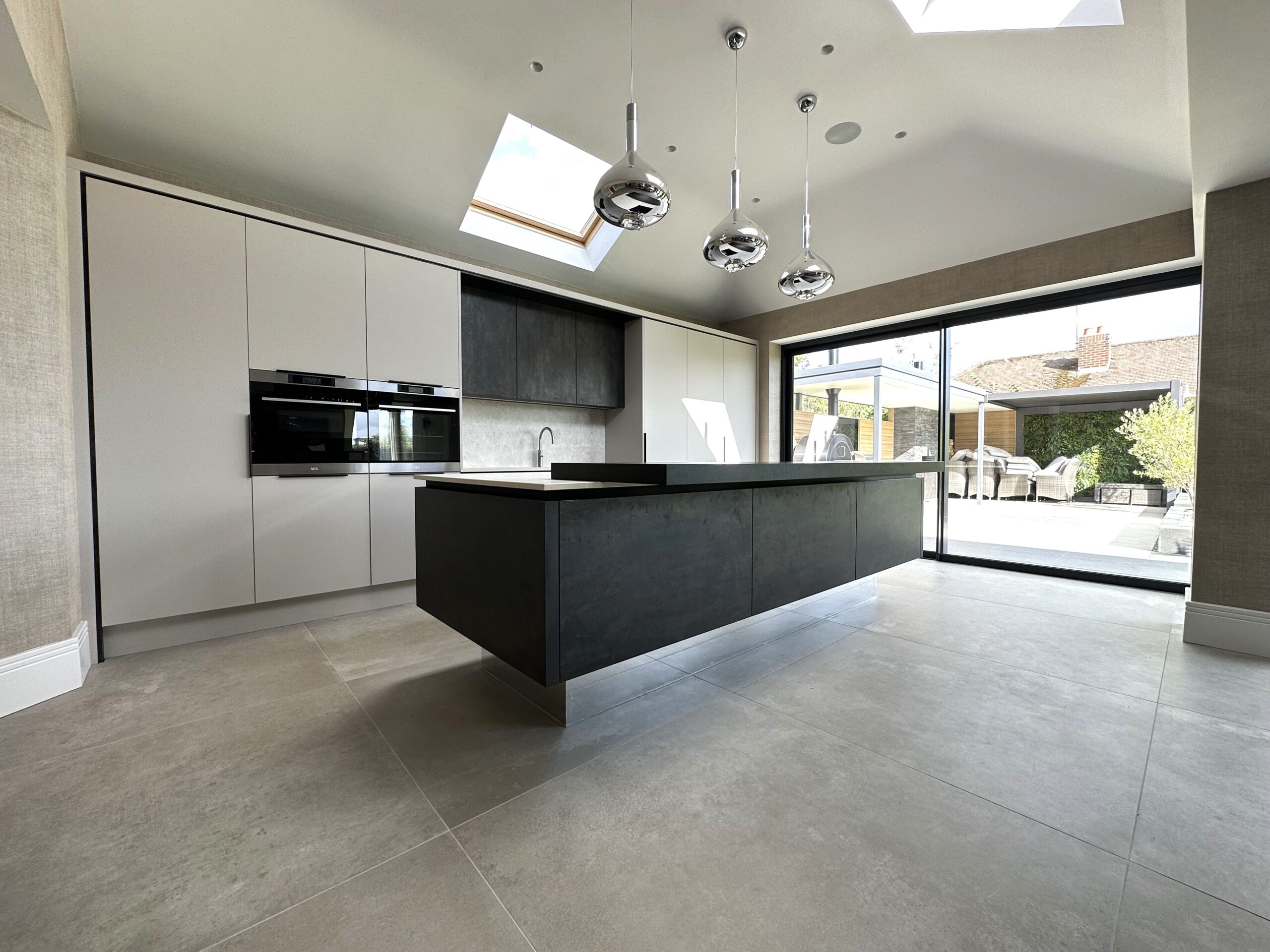 contemporary warm neutral tones cooking dining and living