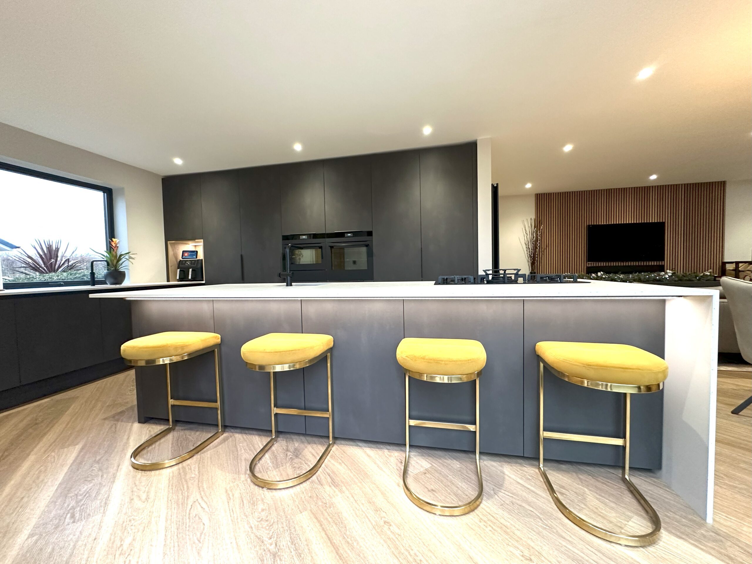 dark rich kitchen and media furniture