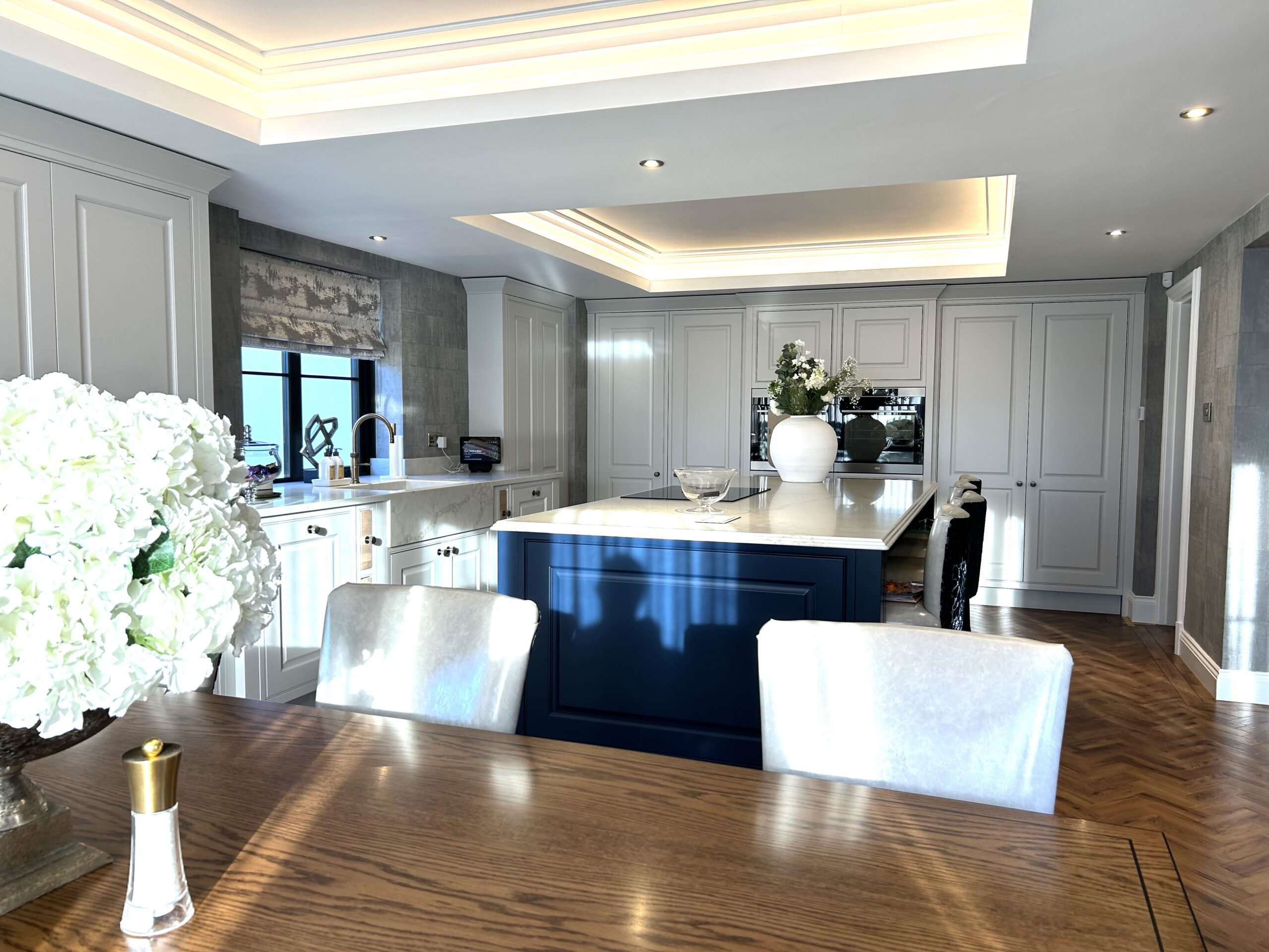 classic styled painted kitchen and media furniture