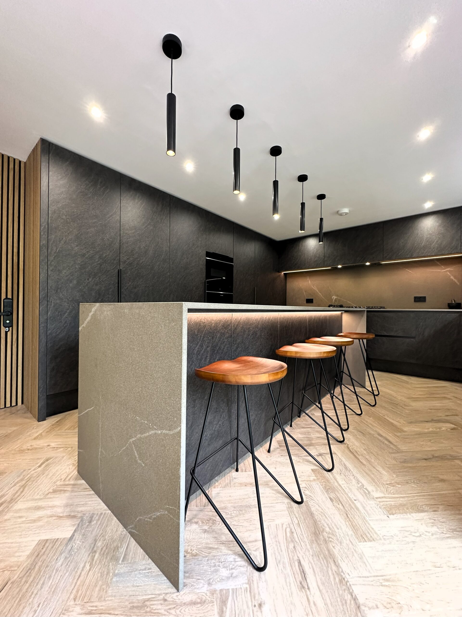 dark stone architectural minimalist luxury kitchen