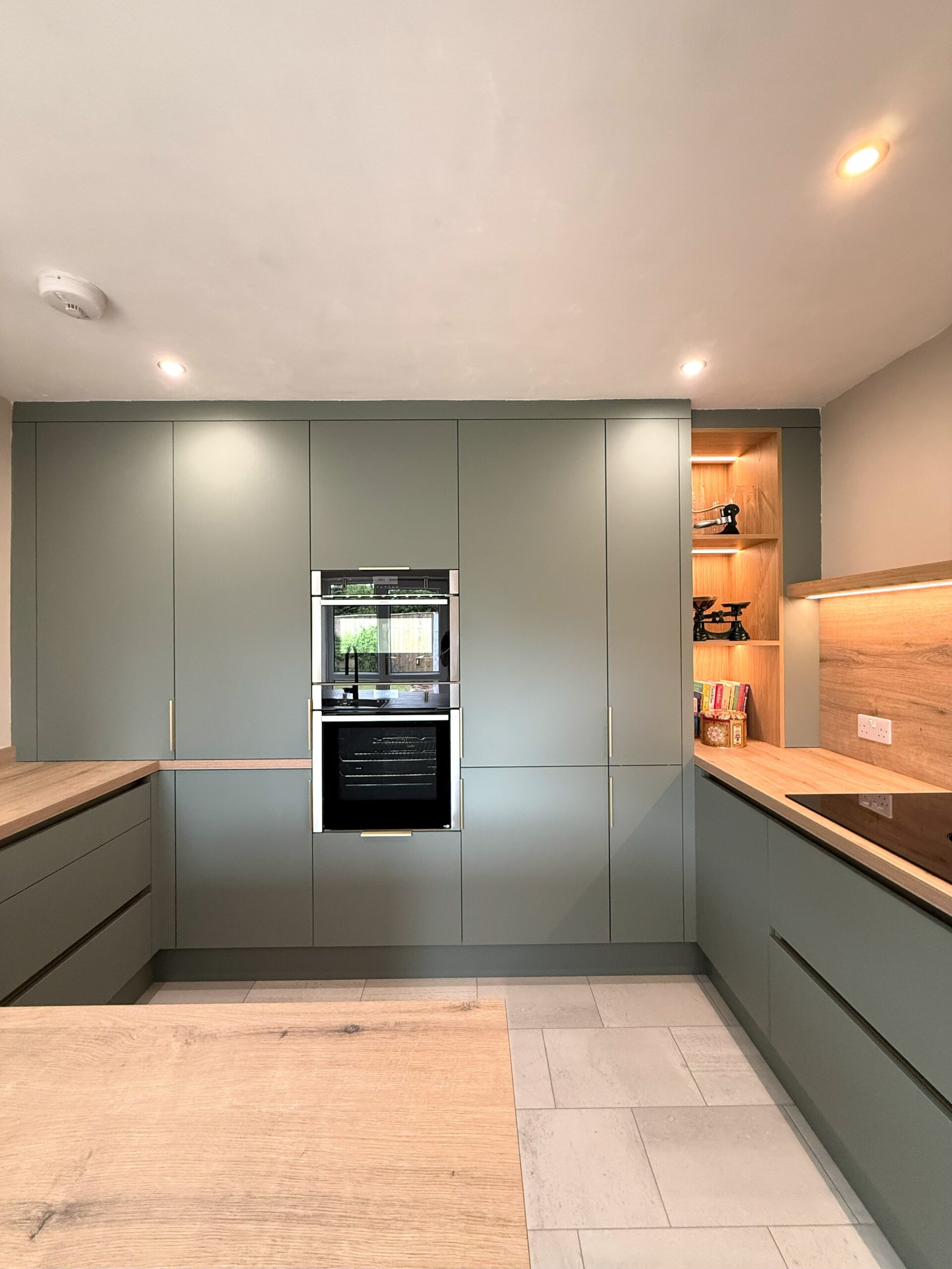 matt handleless kitchen in soft reed green on south tyneside